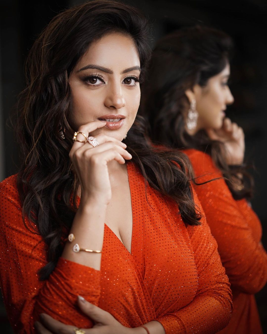 Deepika Singh curvy actress orange high slit dress