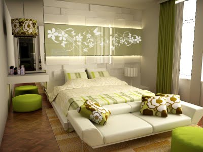 La imagen muestra una decoración en verde de un dormitorio