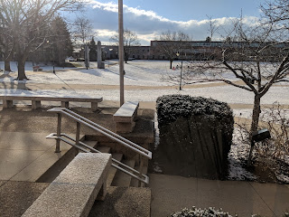 academic quad dusted with snow