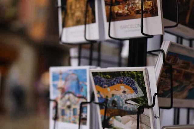 Postcards in a rack, from canva pro