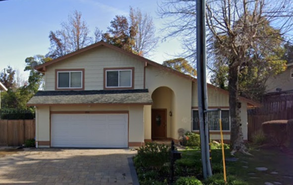 Single elegant arch above a front door on a home in Twin Creeks South by Carl Dame, San Ramon, 1977