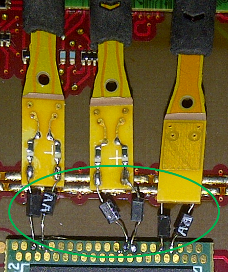 Damping resistors on solder-in probe tips  terminating at chip interposer