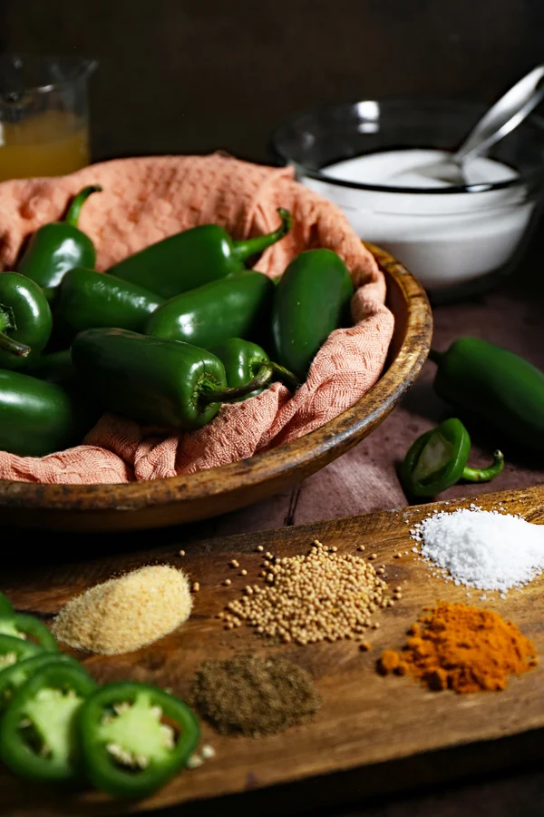 A photo showcasing the key ingredients for making cowboy candy (candied jalapenos)