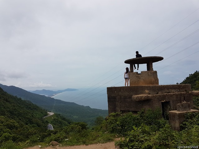 View from the top of the Hai Van Pass. On nice days, one can admire Lang Co beach to the north and spot the winding road leading up to the mountain top. Climbing the old crumbling US-built war bunkers is at own risks.