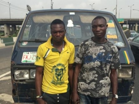 Photo: Danfo Bus Driver & Condutor Arrested For Painting Vehicle In Lagos Police Colours