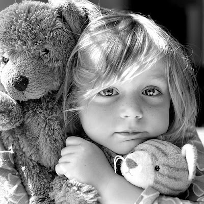 Cute Little Girl with Teddy