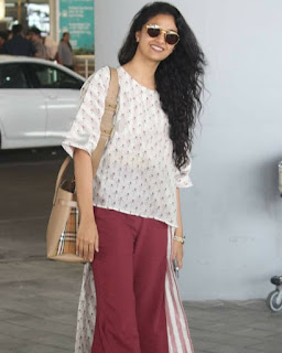 Keerthy Suresh in White and Maroon Dress with Cute Smile Captured at Hyderabad Airport