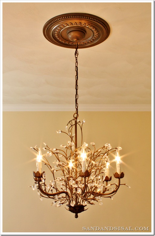 Dining Room Ceiling Medallions - for master bedroom or dining room ceiling ...medallion ... / This dining room uses an open scroll design in a bronze finish.
