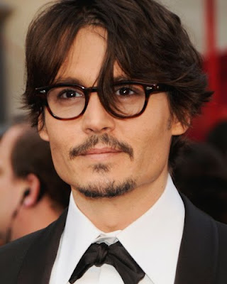 Well, that something is Johnny Deep in a good pair of glasses.