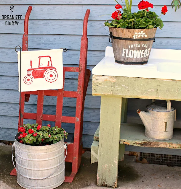 Decorating the Junk Garden Potting Bench  #oldsignstencils #stencils #containergarden #flowergarden #galvanized #farmhouse #junkgarden #gardenjunk #rusticgarden #geraniums #annuals