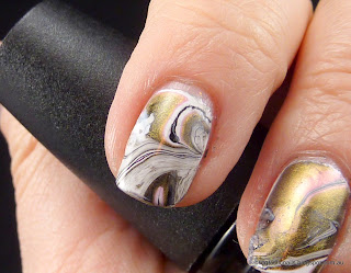 Pink, white and black water marble effect mani