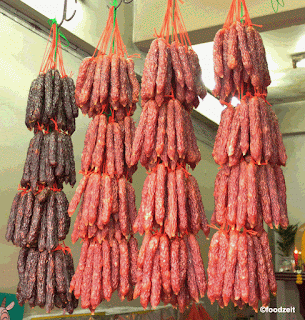 Further down the street in Chinatown you can find those Chinese style sausages hung up in the entrance of a shop