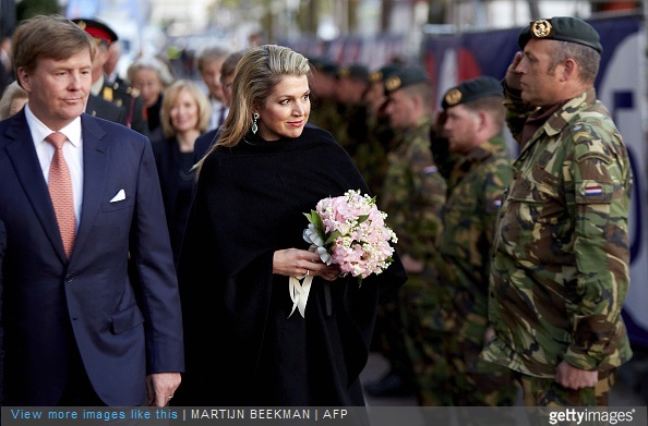 Dutch King Willem Alexander and Queen Maxima arrive at the Dutch 5th of May Liberation concert in Amsterdam on May 5, 2015