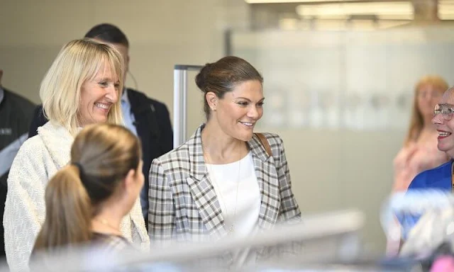 Crown Princess Victoria wore a grey checkered Karah blazer from By Malina. Filippa K white cotton top and beige trousers