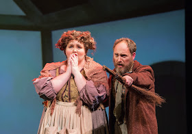 IN PERFORMANCE: soprano LYNDSEY SWANN as Gertrud (left) and baritone SCOTT MACLEOD as Peter (right) in Greensboro Opera's March 2019 production of Engelbert Humperdinck's HÄNSEL UND GRETEL [Photograph © by VanderVeen Photographers]