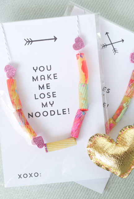 easy craft for preschoolers painted pasta strung on string or yarn tied at ends for cute pasta necklace