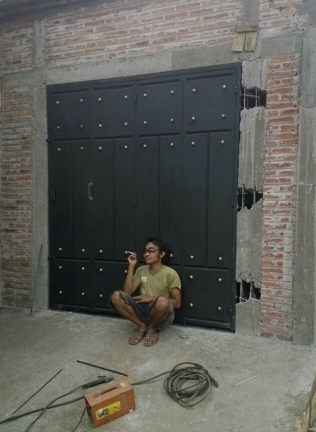 Pintu lipat plat pemasangan di pancoran jakarta