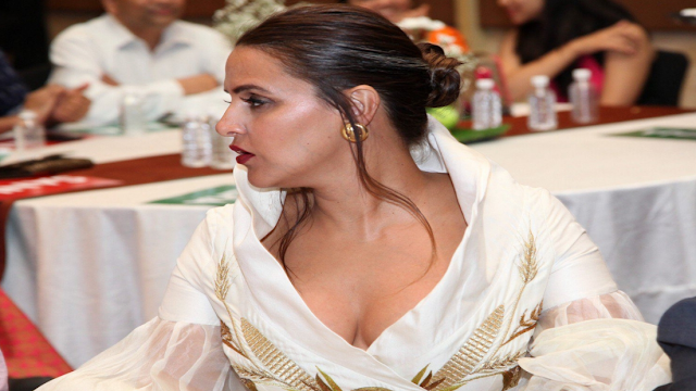 Neha Dhupia Posing Braless Bulging Melons & Deep Cleavy