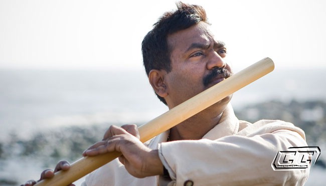 Flautist and Composer Naveen Kumar with his flute playing live