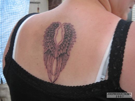 Wings On Back Tattoo. Back Angel Wings Tattoo Design