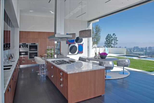 Large kitchen with city views 