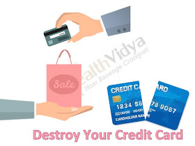 credit card transaction and a credit card cut into two