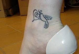 dove tattoos meaning and pictures