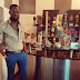 Dbanj thanks God as he poses besides all his awards