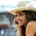 Hat, flower, smile made beauty