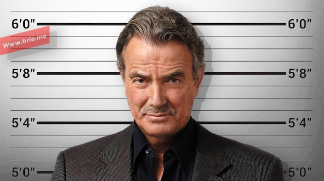 Eric Braeden standing in front of a height chart