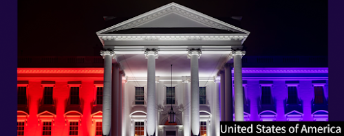 United States of America photo in Washington, DC, July 4th, 2020. Red, white and blue lights on.