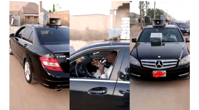 Nigerian Man Seen Selling herbs with microphone in a Benz c300 (Video) 