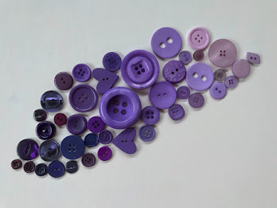 An achromatic scale in purple using buttons