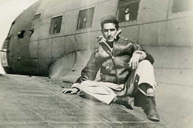 Louis Pietrasz on the wing of an aircraft