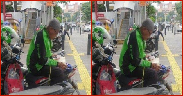 Kisah Dibalik Viral Foto Driver Ojol Baca Alquran di Atas Motor Sembari Menunggu Dapat Orderan