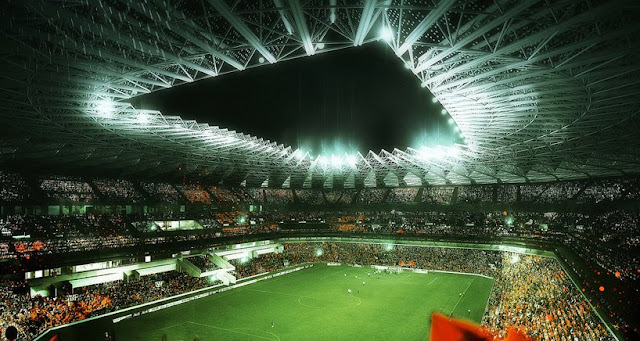 Rendering of new Grande Stade de Casablanca by SCAU, Casablanca, Morocco as viewed from inside with football field 