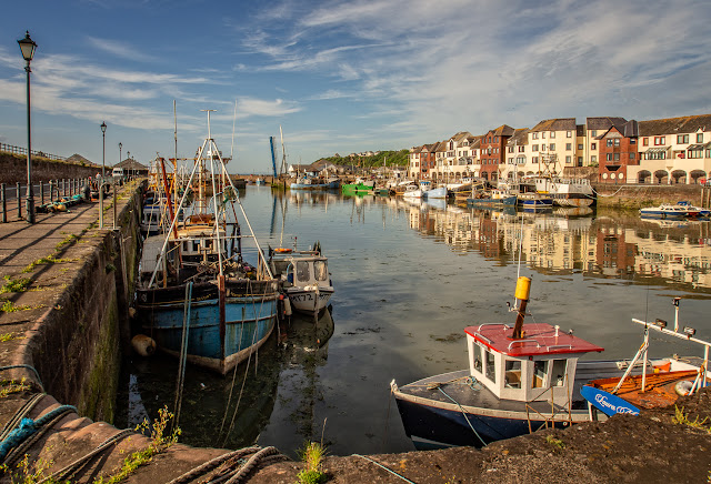 Photo of fishing boats in Maryport Harbour at low tide