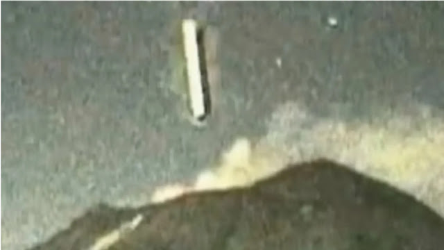 UFO flying into Popocatépetl volcano on webcam.