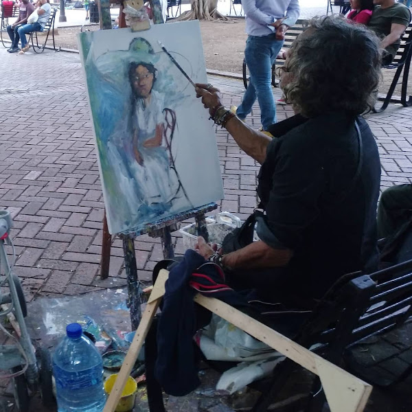 Alejandro Alsina pintando una dama