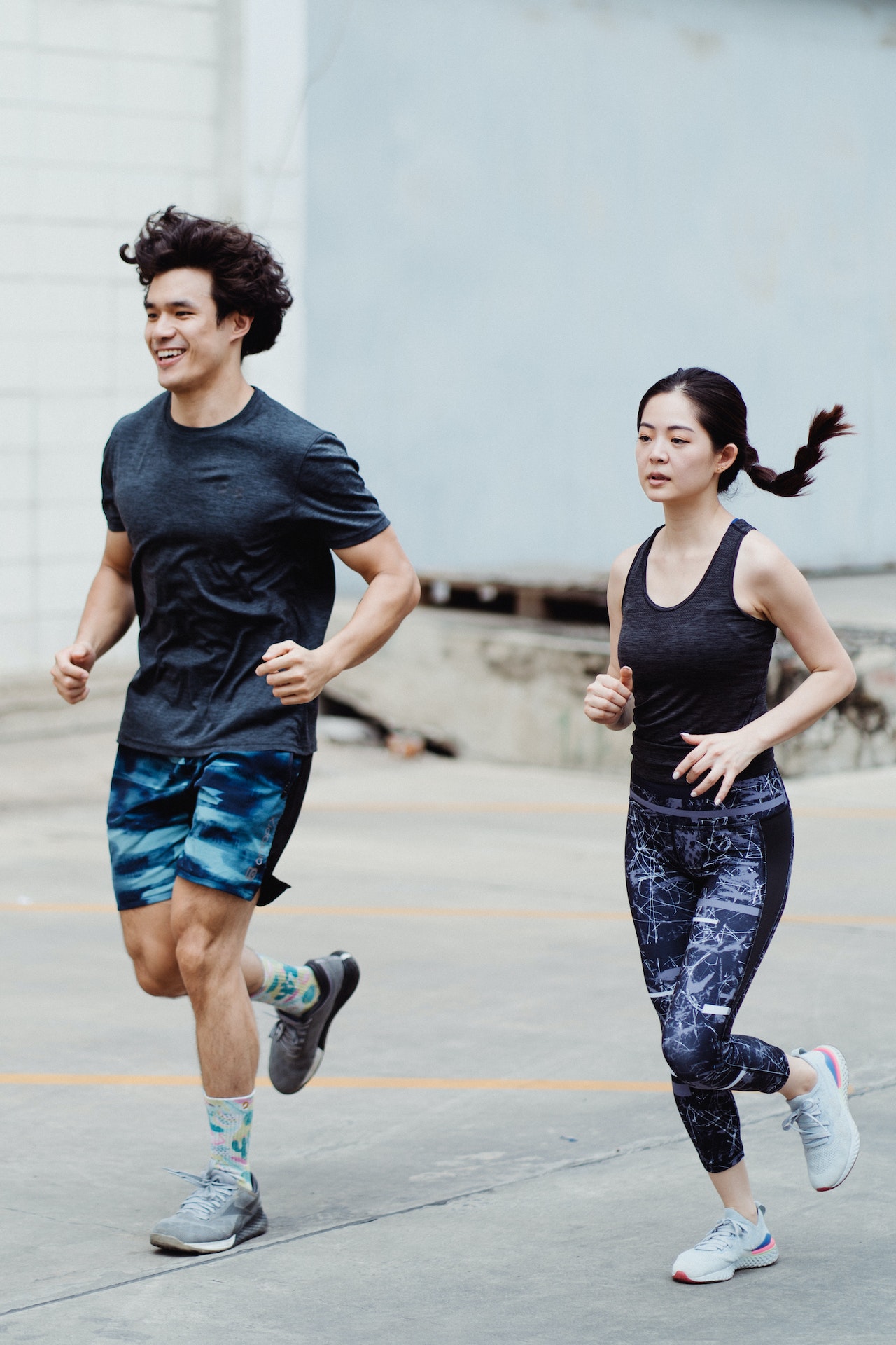 a guy and lady running