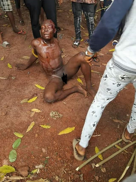 Photos: Man stripped, beaten and nearly killed for stealing Keke in Umuahia