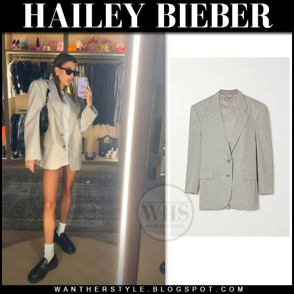 Hailey Bieber in grey blazer, white socks and loafers