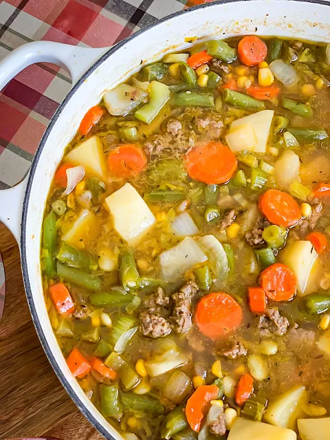 Hamburger Soup is warming and satisfying, loaded with vegetables.  Ideal comfort food on cold nights.