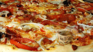 طريقة عمل البيتزا الايطالية بالصور خطوة خطوة وعجينة وصوص البيتزا pizza recipes