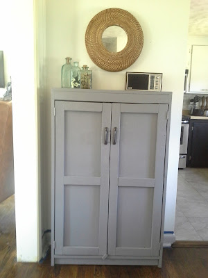 Grey cabinet dining room