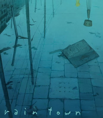 floor with water and rain town title on it. girl and wood robot at glance in the cover