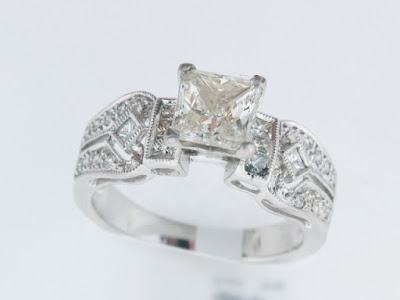 This simple antique style ring has a 135 Carat diamond solitaire in the 