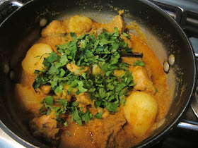 Food Lust People Love: Burmese Chicken Curry begins with a fragrant cayenne spiked curry paste made onions, garlic and ginger. Cinnamon sticks are added while the chicken slowly simmers. The delightful aroma is  will bring the family into the kitchen to see what's cooking!