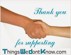 Thank you from TWDK. Photograph of two people shaking hands.