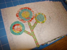 Bloom Where You Are Planted raw edge applique flower quilt